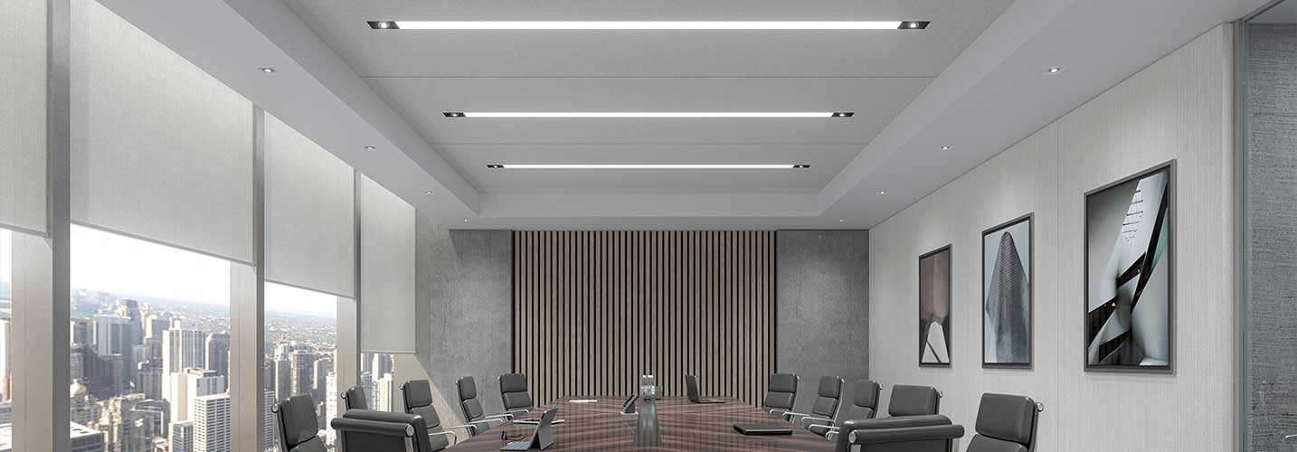 Boardroom featuring a series of 8' runs of 3Gi integrating LINIA diffused light insert and Madison spot lights at either end