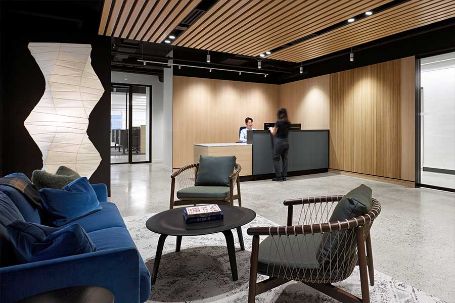 Reception at Extendicare head office, in Toronto, Canada, featuring multiple runs of 3Gi recessed with Madison spotlights, HVAC, and speaker inserts